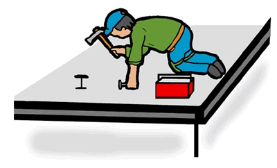 Roofer on a Flat Roof Building