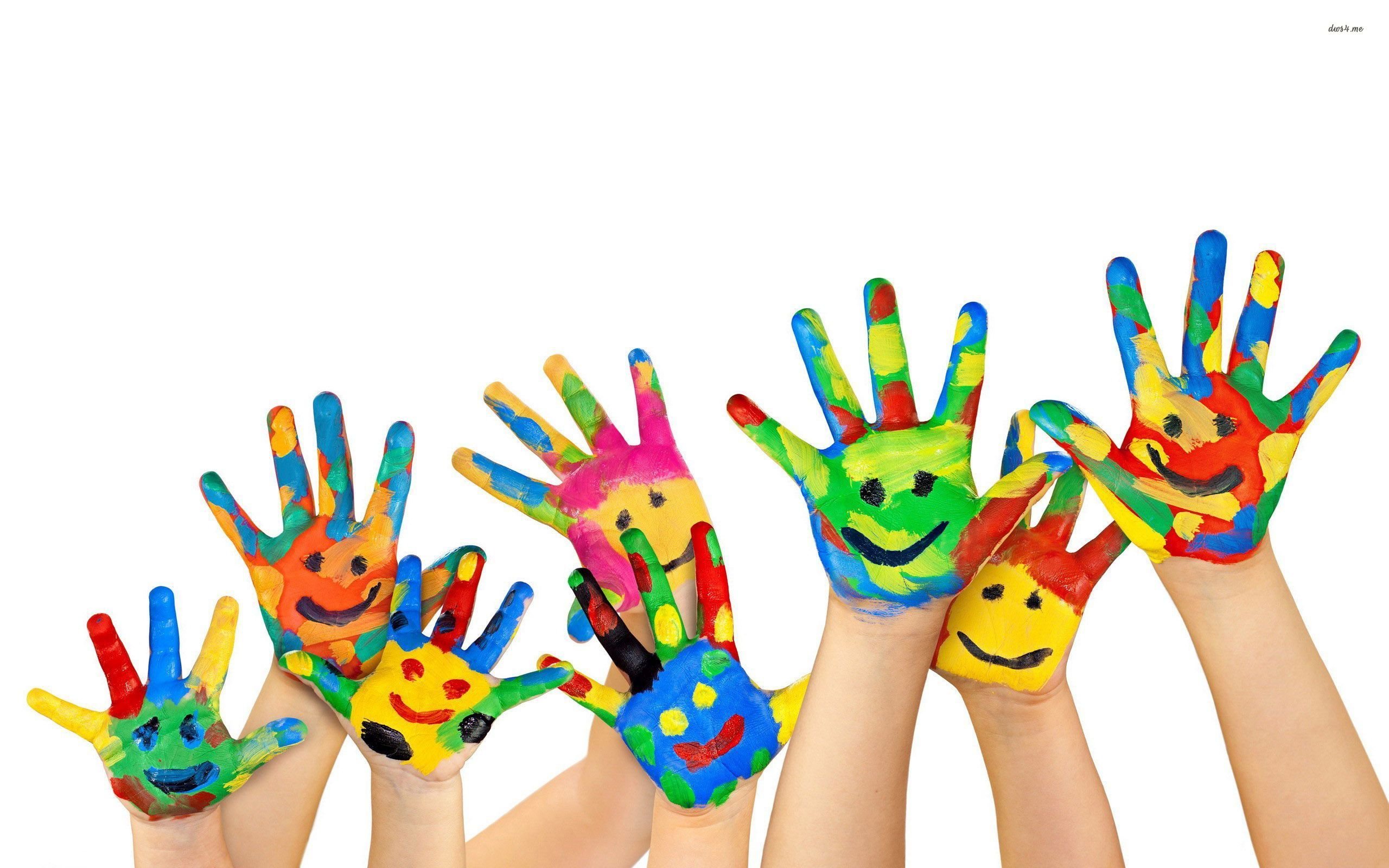 Smileys Painted On Hands Wallpaper