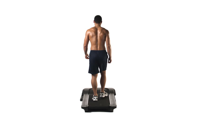 Wide Shot Of An Ethnic Man Running On A Treadmill, As Seen From ...