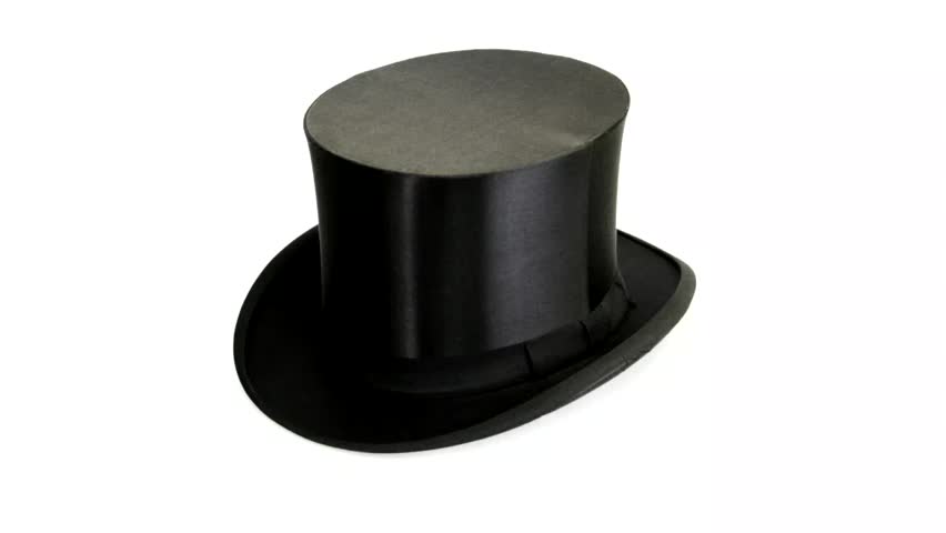 Magician Casts A Spell On The Black Top Hat With A Magic Wand To ...